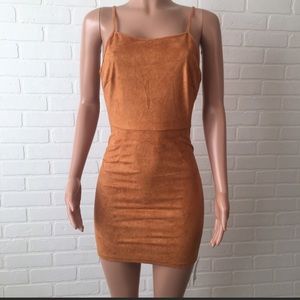 NWT bodycon suede like dress with tie back detail
